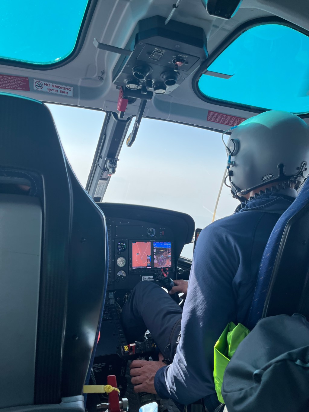 Helicopter ride to Lukla – Rooftops, Terraced fields and snow-capped mountains in the&nbsp;horizon